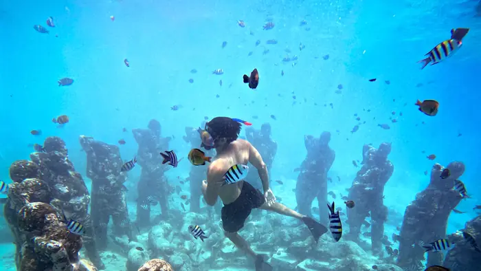 Snorkelling with the underwater statues off Gili Trawangan