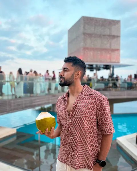 Mohnish with a coconut at Savaya, Uluwatu